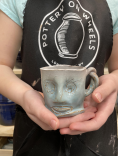 pottery face mug