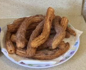 a plate of churros