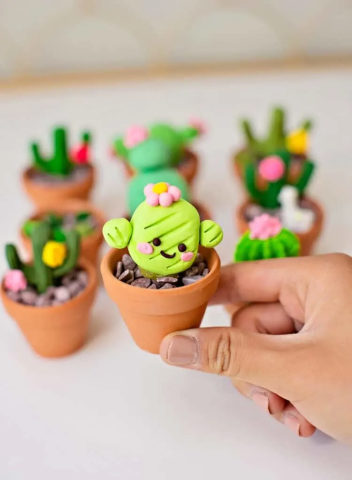 cute clay cacti in pots