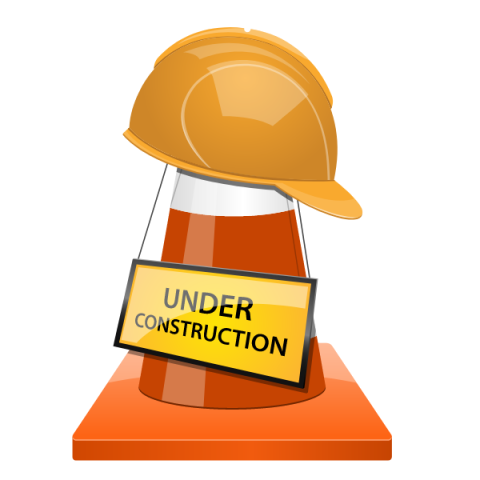 construction zone sign on cone with hard hat