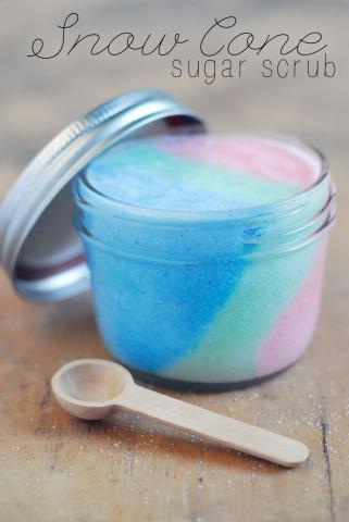 glass with multi-colored layers (blue, green, pink) sugar scrub