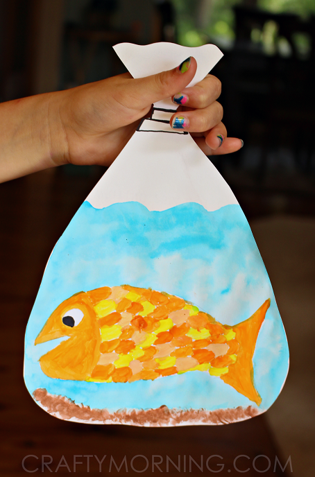 a painted goldfish in a bag