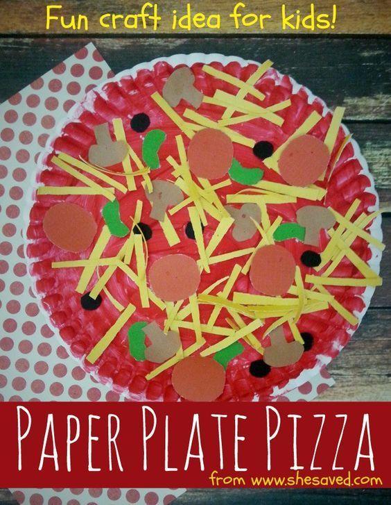 Paper plate painted red with various paper pizza toppings.