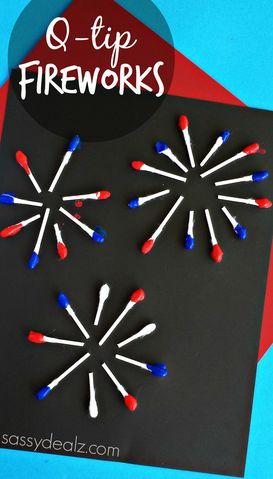 Painted Q-tip fireworks on black paper.